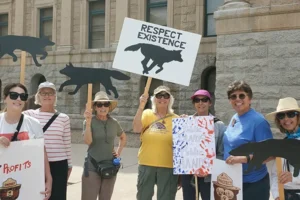 Advancing Science-Based Mexican Gray Wolf Recovery group with signs